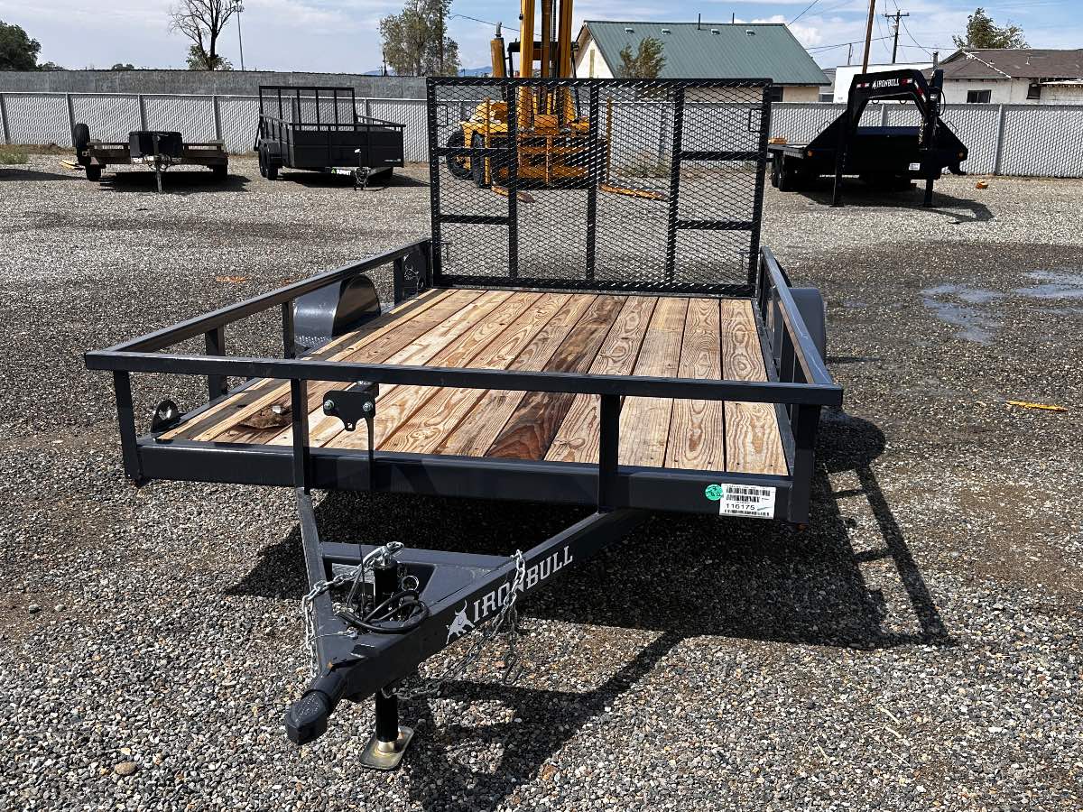2026 Iron Bull UTB8312 New utility trailer, 12'X83", 2,990 lb GVWR, for sale at The Trailer Store in Winnemucca, Nevada (I-80), stock #IB-16175 — rear and ramp view