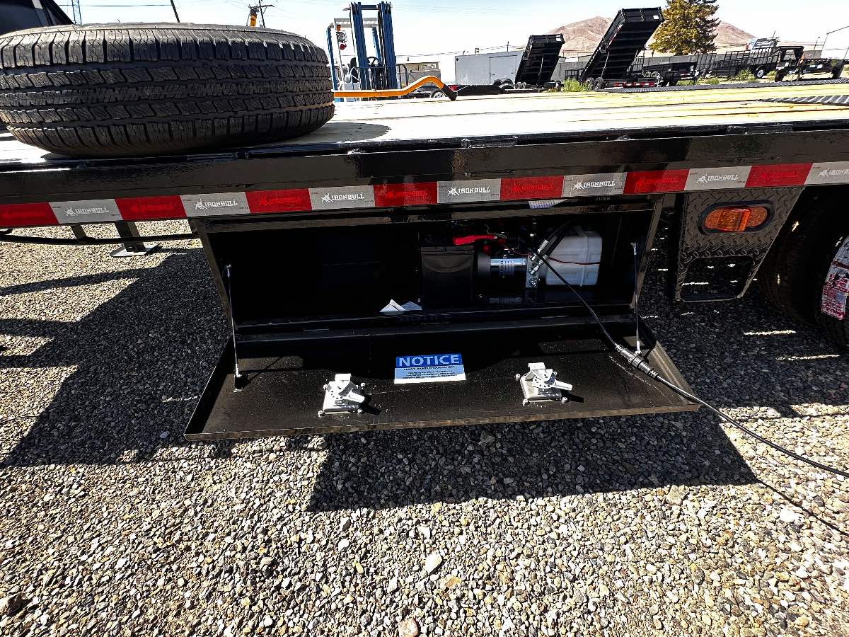 2027 Iron Bull 28' HYDRAULIC DOVETAIL New equipment / flatbed trailer, 28'X102", 22,000 lb GVWR, for sale at The Trailer Store in Winnemucca, Nevada (I-80), stock #TTS-V1916482 — axles and undercarriage