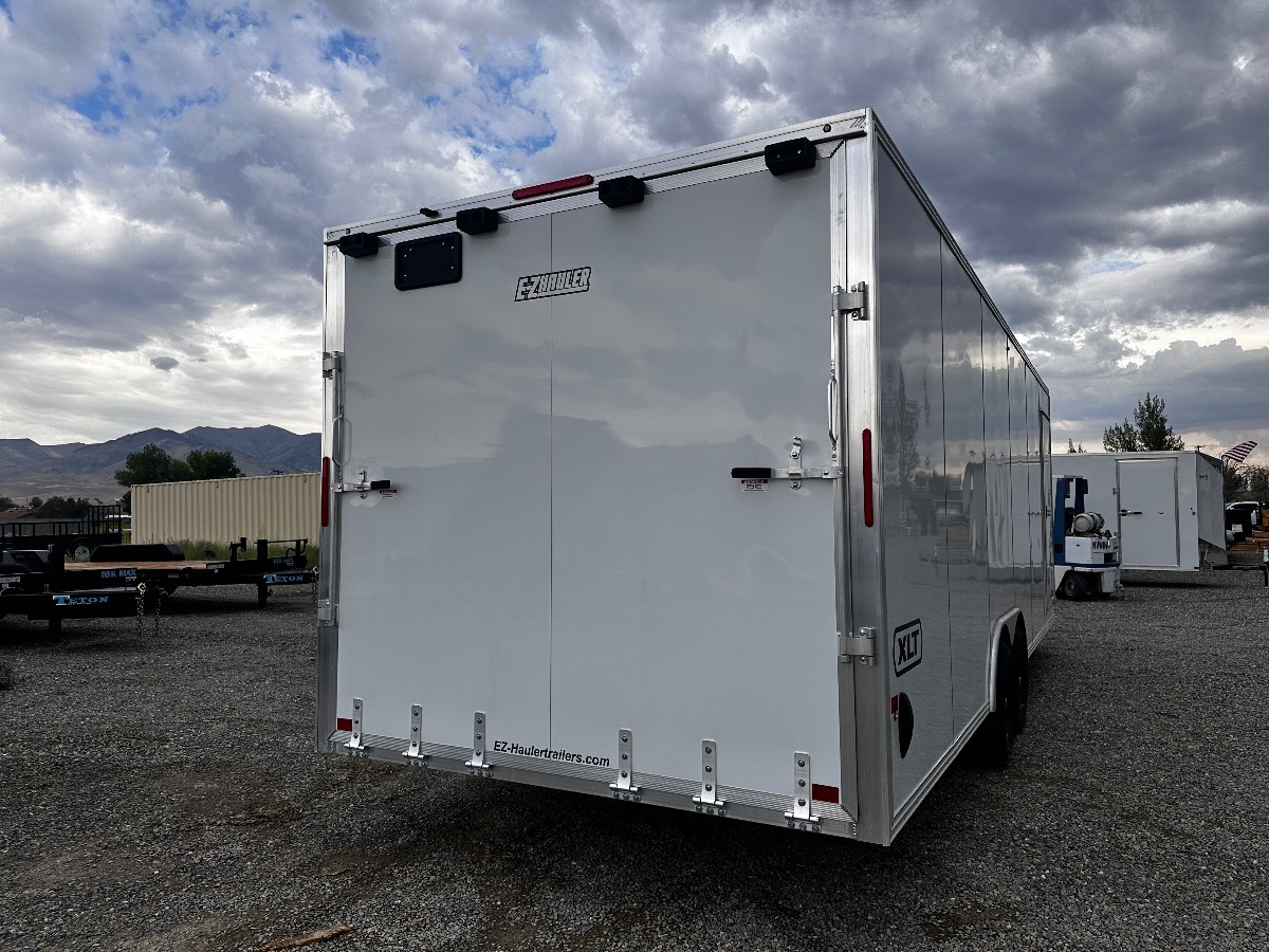2026 EZ Hauler EZEC8.5X24CH-IF New cargo trailer, 8.5X24, 9,990 lb GVWR, for sale at The Trailer Store in Winnemucca, Nevada (I-80), stock #TTS-B053962 — axles and undercarriage