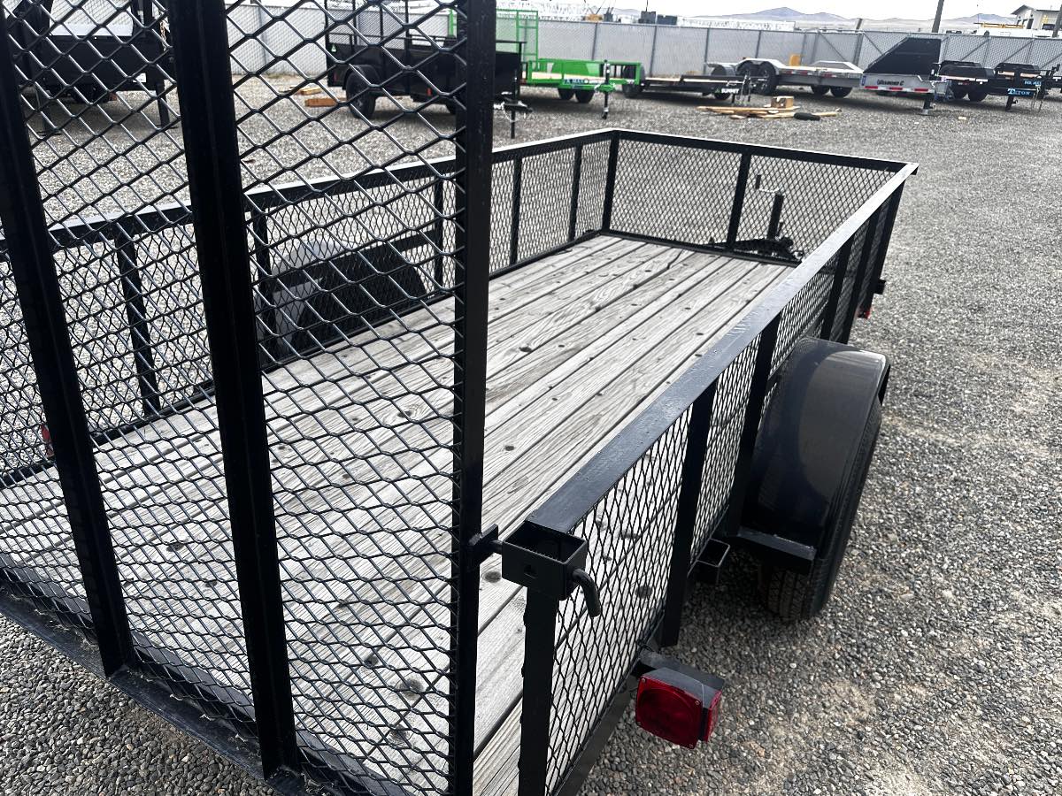 2025 Carry-On 5X12' Mesh Sides New utility trailer, 5X12, 2,990 lb GVWR, for sale at The Trailer Store in Winnemucca, Nevada (I-80), stock #TTS-N000353 — axles and undercarriage