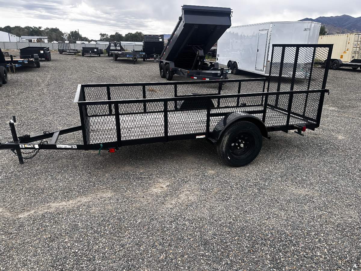 2025 Carry-On 5X12' Mesh Sides New utility trailer, 5X12, 2,990 lb GVWR, for sale at The Trailer Store in Winnemucca, Nevada (I-80), stock #TTS-N000353 — rear and ramp view