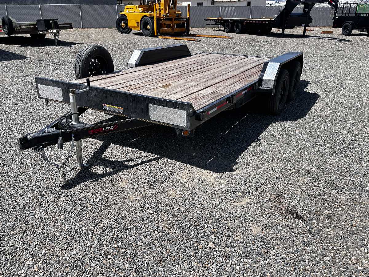 2026 HEARTLAND 16' CAR HAULER Used equipment / flatbed trailer, 16'X82", 7,000 lb GVWR, for sale at The Trailer Store in Winnemucca, Nevada (I-80), stock #TTS-M080268 — exterior side view 2026 HEARTLAND 16' CAR HAULER Used equipment / flatbed trailer, 16'X82", 7,000 lb GVWR, for sale at The Trailer Store in Winnemucca, Nevada (I-80), stock #TTS-M080268 — exterior side view