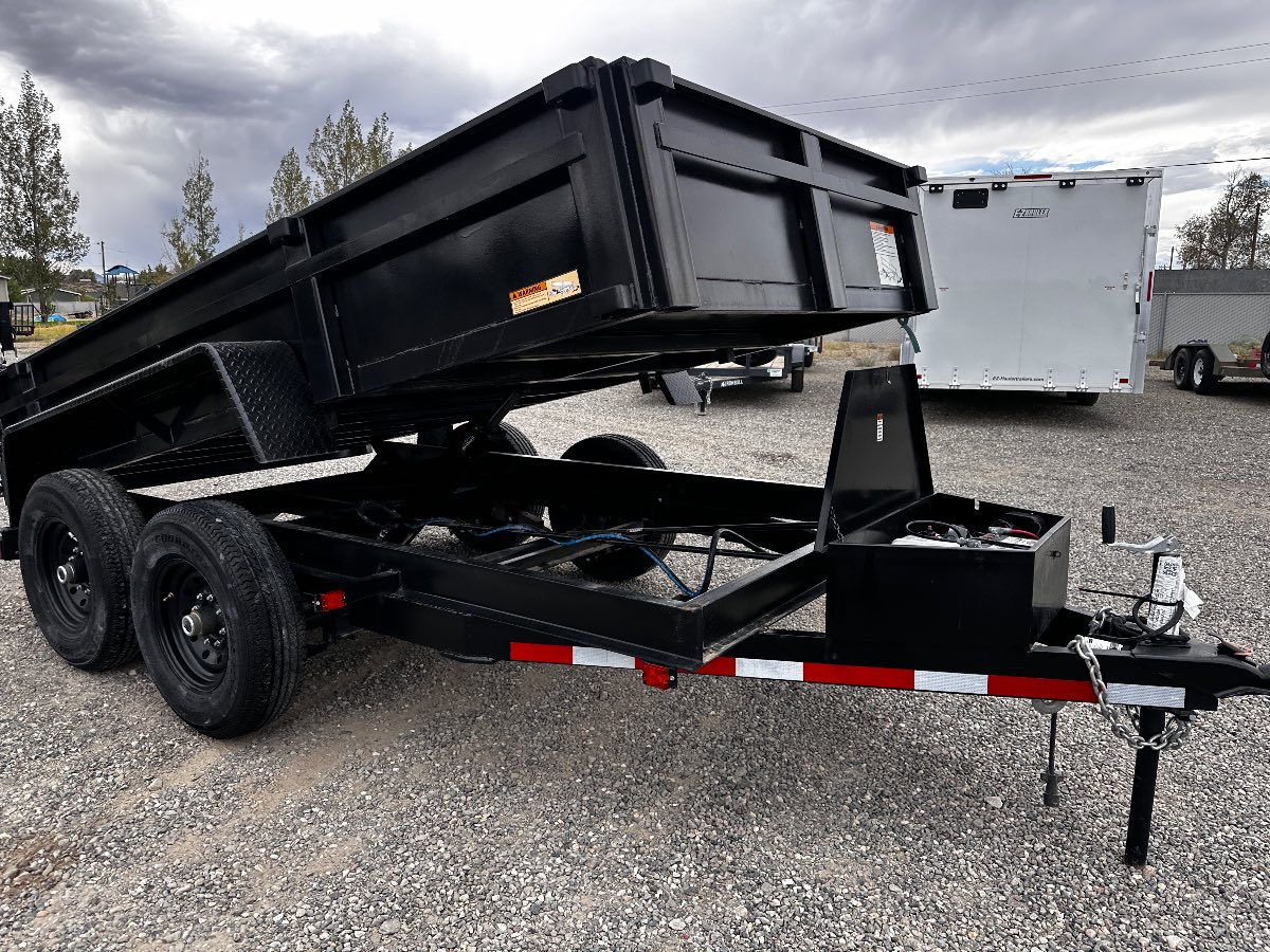 2024 Carry-On 6X12DUMPLP12KECTP New dump trailer, 72X12, 12,000 lb GVWR, for sale at The Trailer Store in Winnemucca, Nevada (I-80), stock #TTS-N012751 — axles and undercarriage