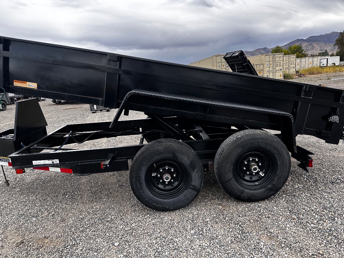 2024 Carry-On 6X12DUMPLP12KECTP New dump trailer, 72X12, 12,000 lb GVWR, for sale at The Trailer Store in Winnemucca, Nevada (I-80), stock #TTS-N012751 — rear and ramp view